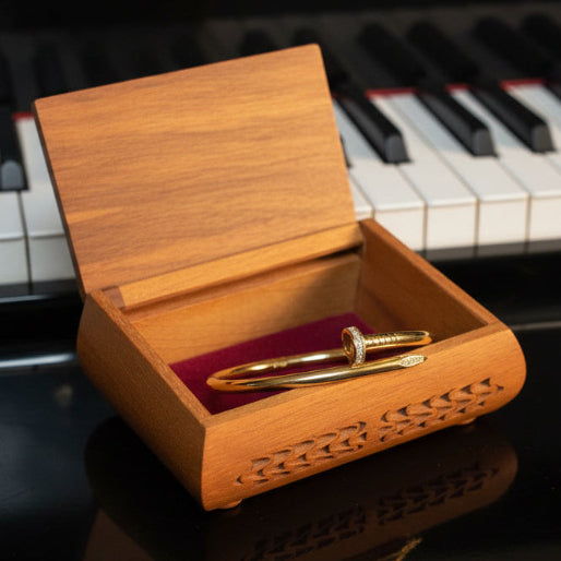 Its sleek, polished finish gives it a luxurious appearance, blending an industrial esthetic with high fashion.