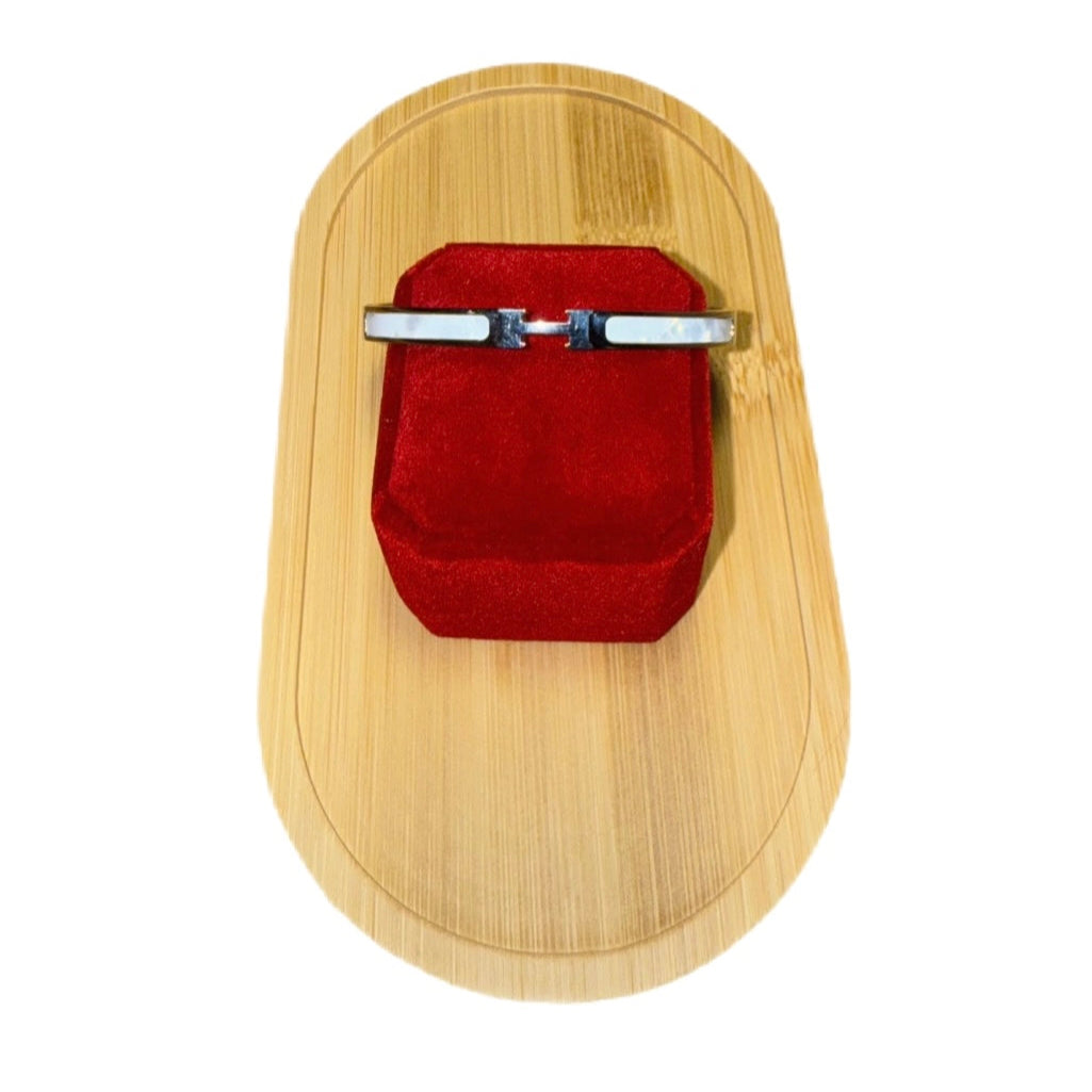 This bright white contrast beautifully with the polished metal, creating a clean and modern aesthetic.