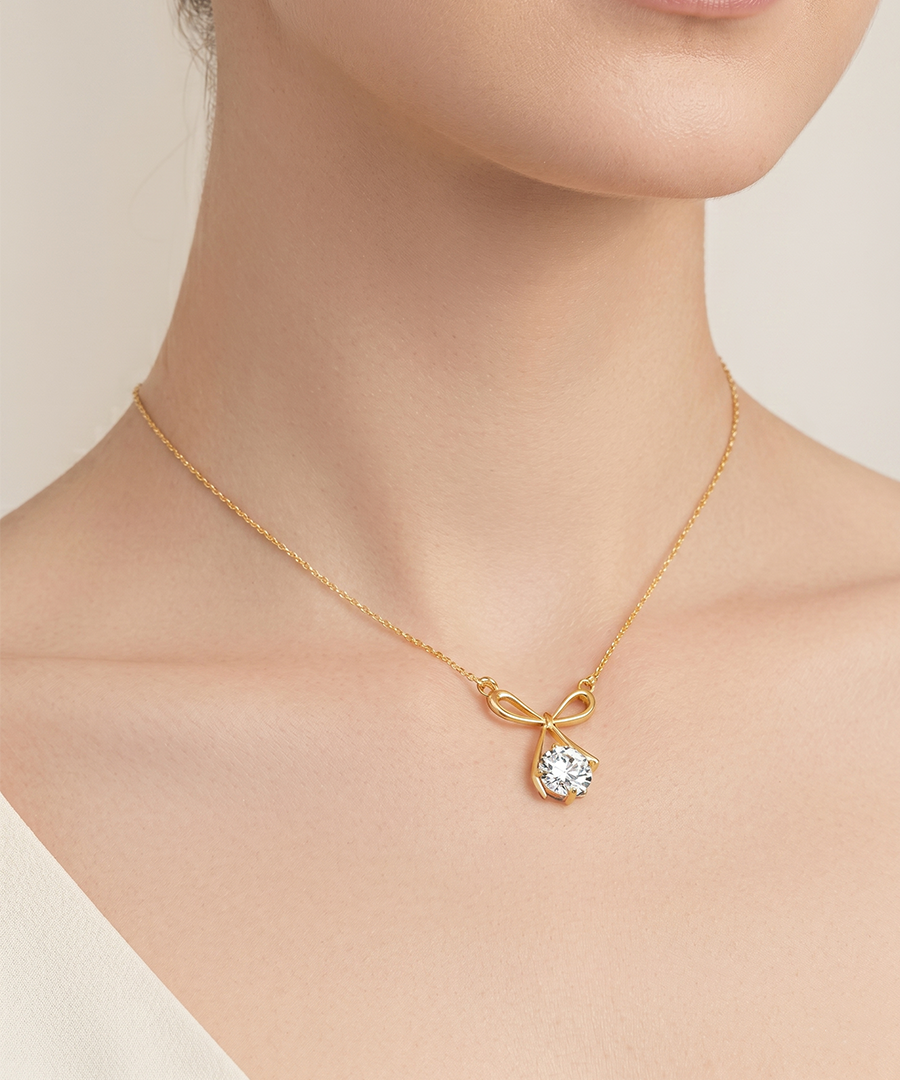 Gold Bow Necklace with Moissanite Pendant