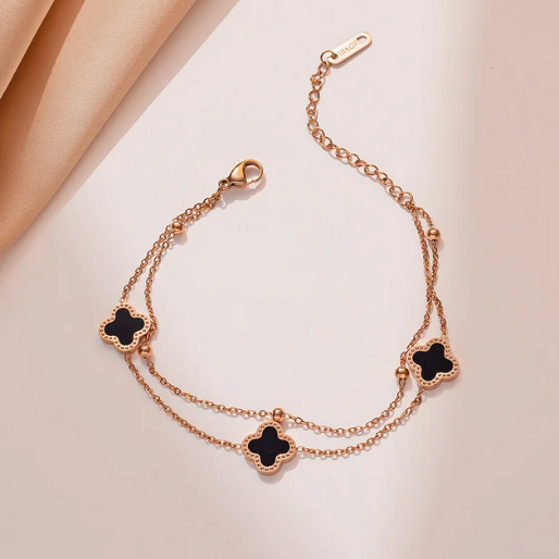 The design, featuring clover motifs and delicate chains, is a popular choice for those seeking a balance between elegance and everyday wearability