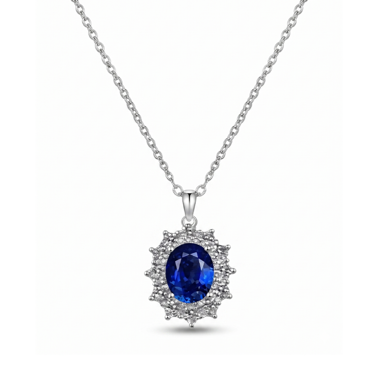 Silver necklace with a blue moissanite gemstone pendant on a white background