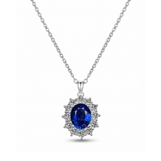 Silver necklace with a blue moissanite gemstone pendant on a white background