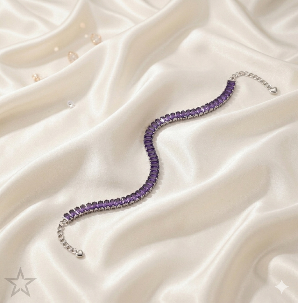Purple beaded tennis bracelet on a white satin surface