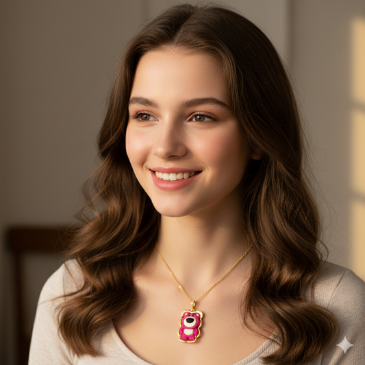Lotso Bear Necklace, with  the memorable Lotso Huggin' Bear suspended from a delicate gold chain, making it a playful and recognizable accessory perfect for fans of the movie or collectors of character merchandise.