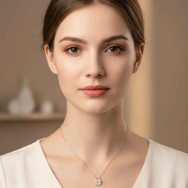 This elegant necklace features a unique pendant designed with four individual heart shapes, hinged and magnetically connected, allowing the flexibility to switch between a playful clover and a romantic heart motif, making it suitable for different moods or occasions