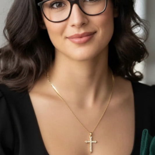 Striking Gold Necklace, featuring a distinctive Nail Cross Pendant. This design combines profound religious symbolism with a unique, contemporary aesthetic.