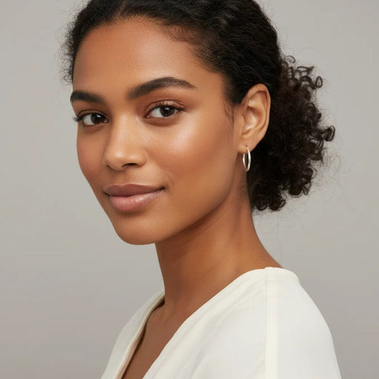 Silver Hoop Earrings, with clear lines and understated elegance. Smooth, highly polished and reflective. 