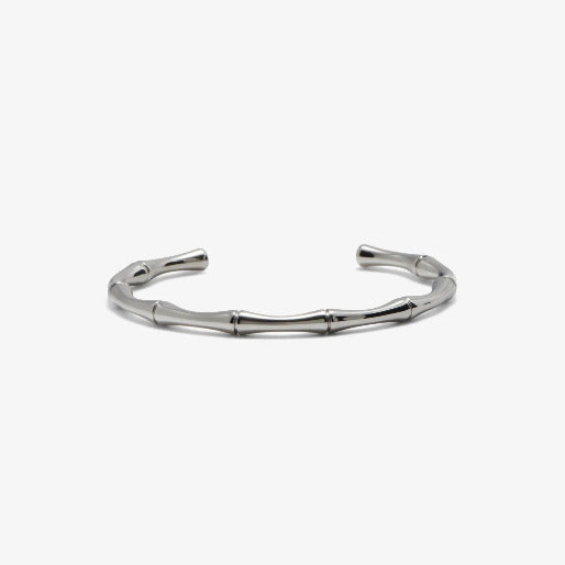 Crafted from high-grade stainless steel, it features a polished silver finish and an open ended design, making it slightly adjustable to fit various wrists sizes.