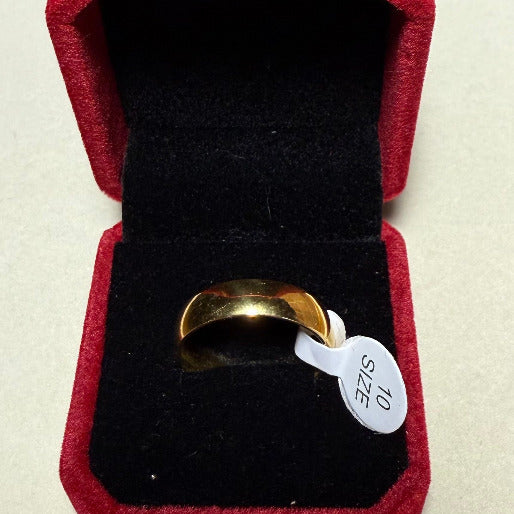 Gold band ring with a minimalist design, that makes it a versatile piece, often used and wedding band, engagement ring or everyday accessory. Size 10 as the mark in the  picture. 