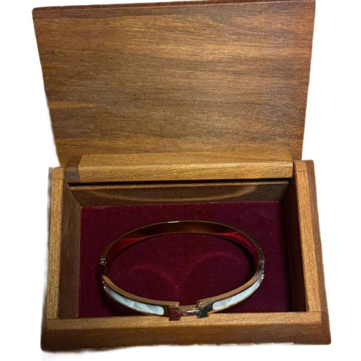 Crafted in titanium steel, these bangles are built for everyday wear, resisting. tarnishing and water damage, which is signifiant advantage for longevity.