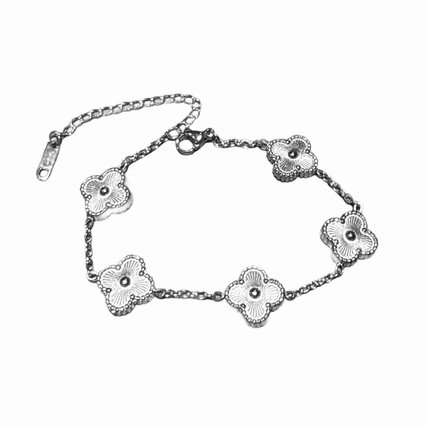 Silver bracelet with clover designs on a white background. Here it is shown the extender 