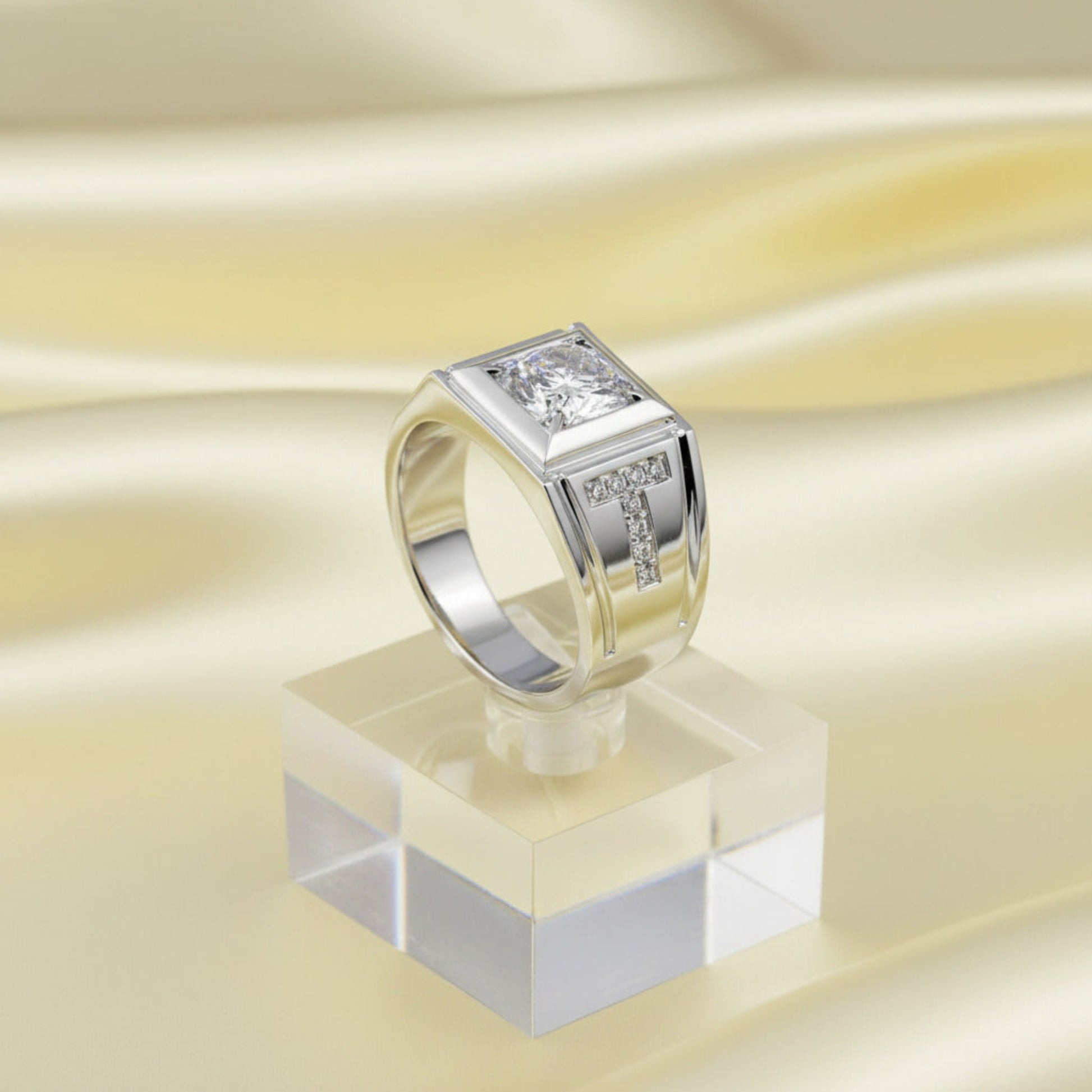 Silver ring with a clear gemstone on a white background
