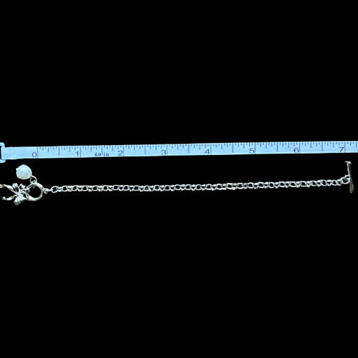 Bracelet measures 7 inches, which is standard for bracelets.