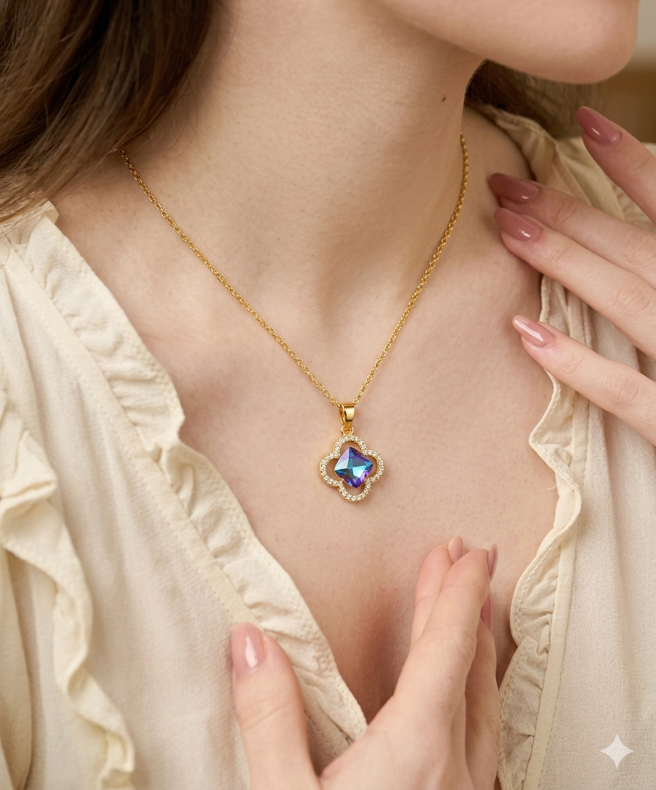 Gold Clover Necklace with an Iridescent Gem