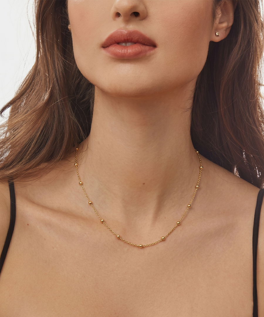 GOLD BEADED STATION CHAIN NECKLACE