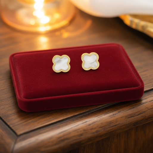 Gorgeous pair of stud earrings featuring. a distinctive four-leaf clover design. Designed for pierced. ears, these earrings offer a classic and elegant accessory suitable for various occasions. 