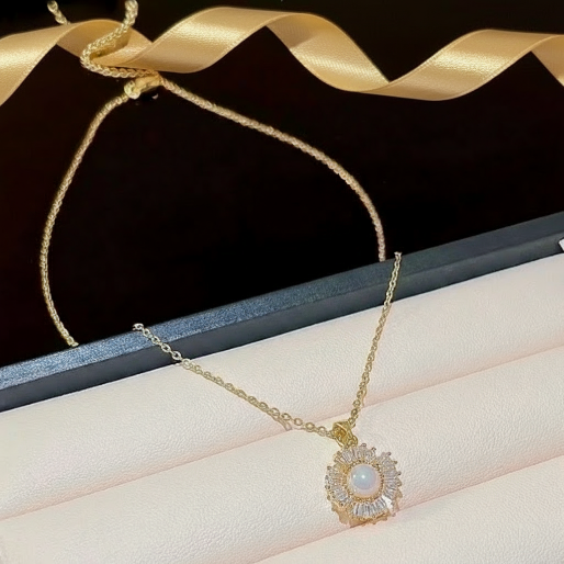 This necklace's adjustable length and durable composition ensure both beauty and practicality for various occasions. The precise arrangement of the baguette crystals enhances the pearl's luster and gives the entire piece a luxurious, sophisticated feel.