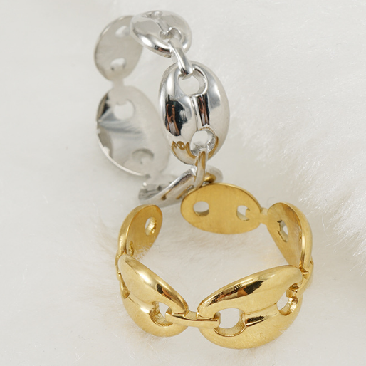 Gold and silver chain-style open ring on a white background