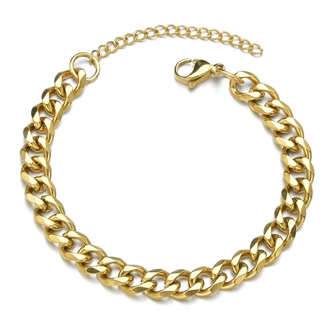 Gold Cuban chain bracelet on a white background