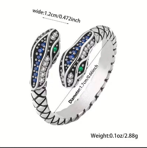 Silver ring with gemstones and measurements on a white background