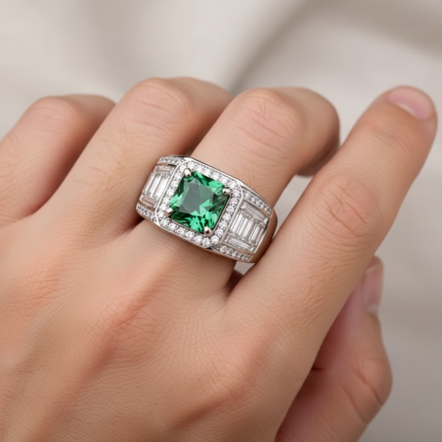Moissanite green ring and diamond accents on a finger showing its details