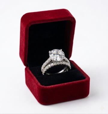 Silver Bridal Set with Round Central Moissanite Stone and Pave Bands