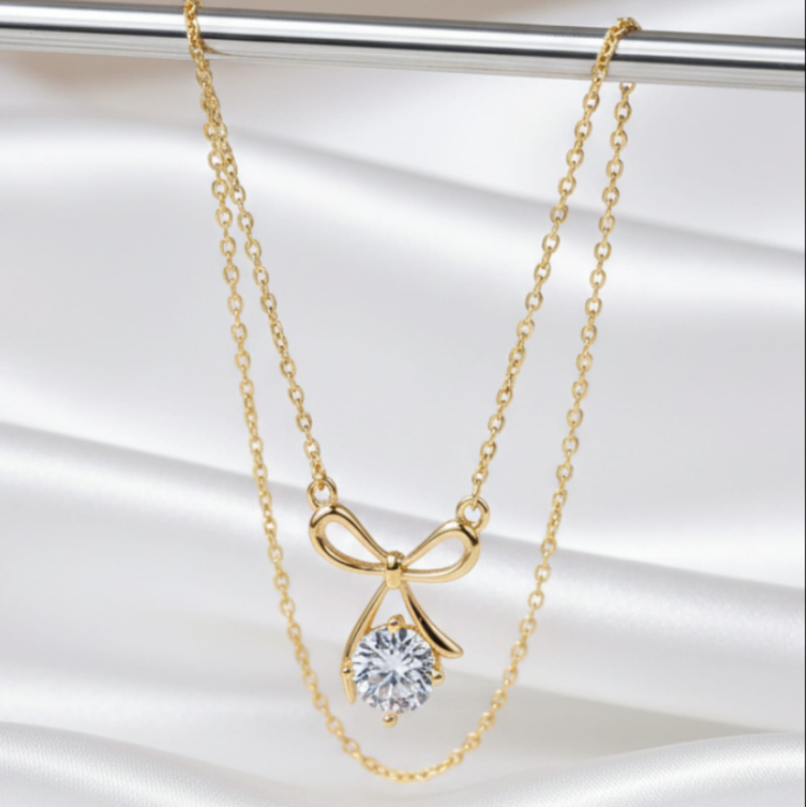 Gold Bow Necklace with Moissanite Pendant