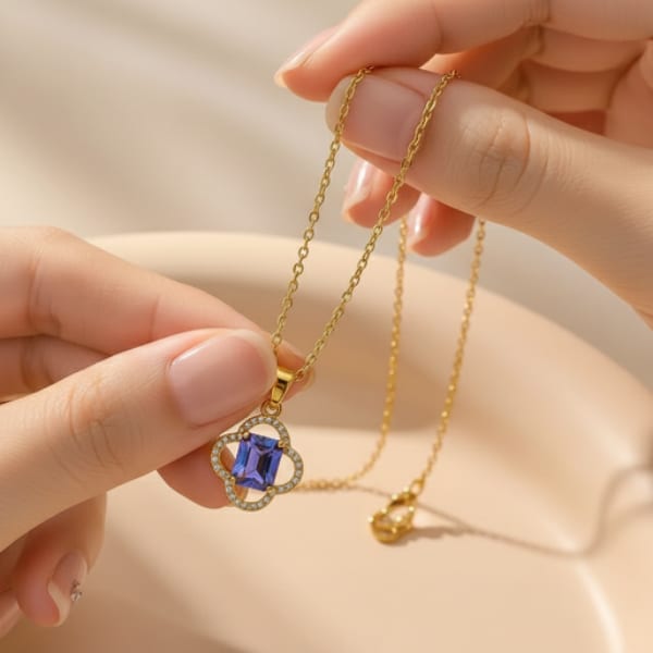 Gold Clover Necklace with an Iridescent Gem